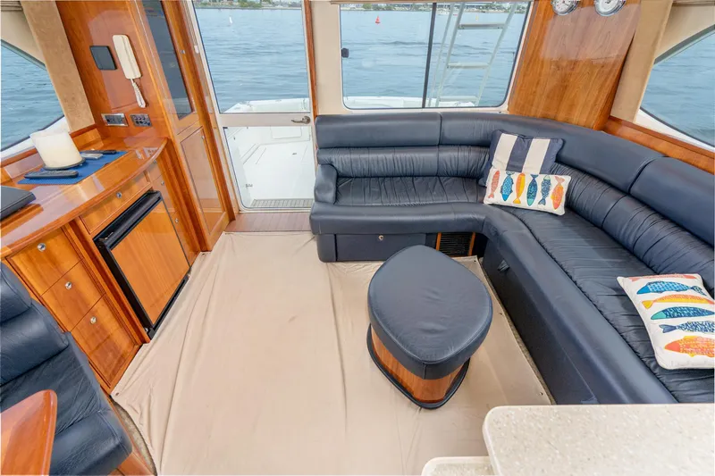 Slide: The Image of Luxurious interior of 2009 Riviera 47 Open Flybridge Series II yacht with leather seating. - 40