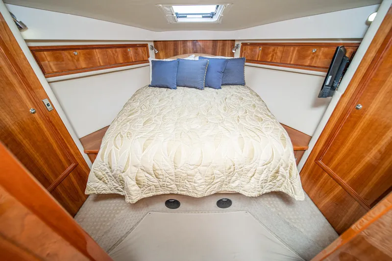 Slide: The Image of Luxurious cabin interior of 2009 Riviera 47 Open Flybridge Series II yacht. - 45