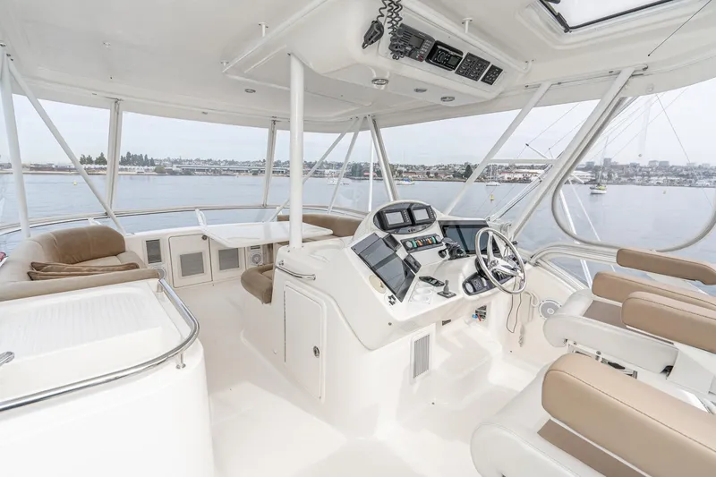 Slide: The Image of Luxurious 2009 Riviera 47 Open Flybridge Series II yacht interior with panoramic water views. - 8