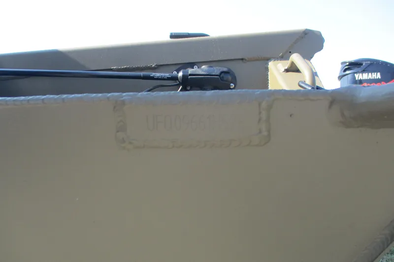 Slide: The Image of 2026 Gator Tail 1748 boat with Yamaha motor, close-up of hull and serial number. - 10