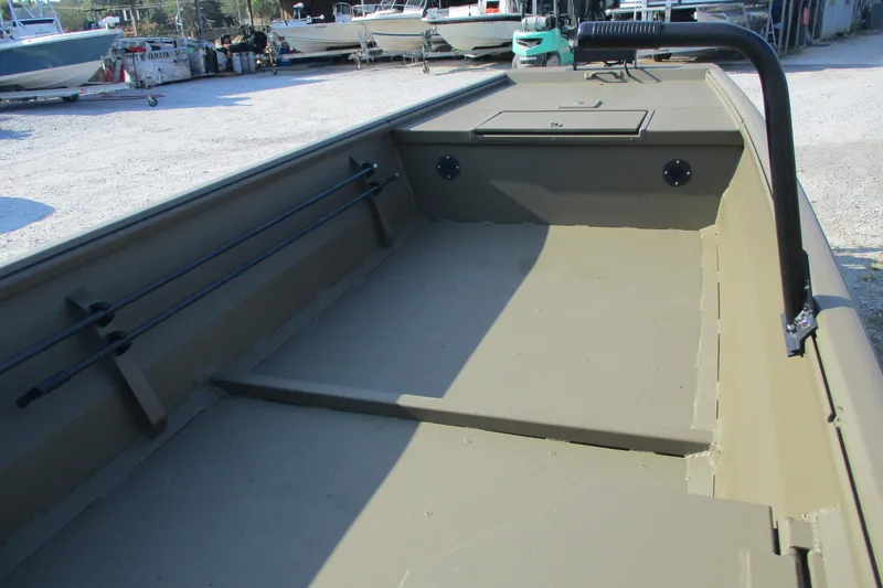 Slide: The Image of Interior view of a 2026 Gator Tail 1748 boat, showcasing spacious deck and storage. - 11