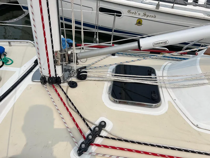 Slide: The Image of Sailboat deck with rigging lines and hatch, Tartan 3400, 2007 model. - 12