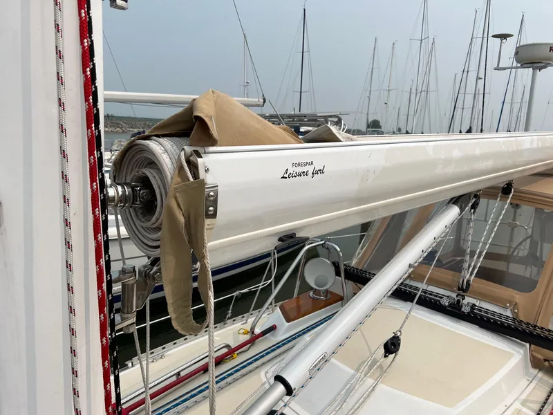 Slide: The Image of Sailboat mast and rigging on a 2007 Tartan 3400, docked in a marina. - 13