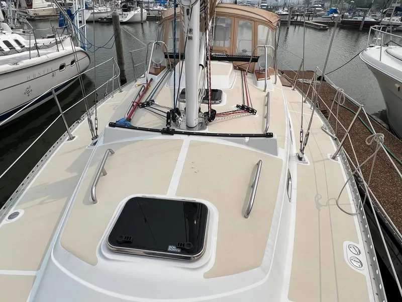Slide: The Image of Sailboat deck view of 2007 Tartan 3400, docked in a marina. - 16