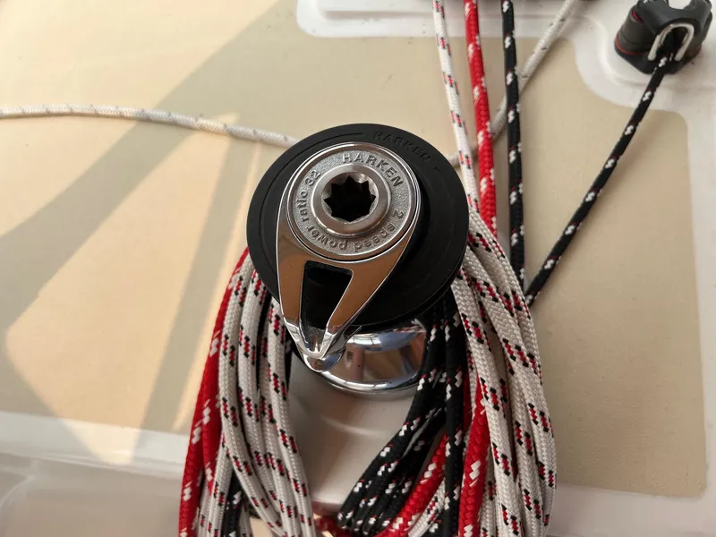 Slide: The Image of Winch with colorful ropes on a 2007 Tartan 3400 sailboat deck. - 25