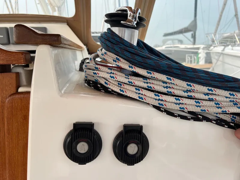 Slide: The Image of Sailboat winch with ropes on a 2007 Tartan 3400 yacht deck. - 29