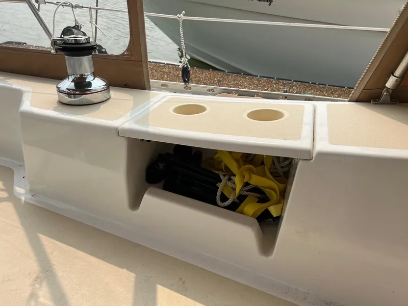 Slide: The Image of Tartan 3400 sailboat cockpit with winch, storage, and cup holders, 2007 model. - 30