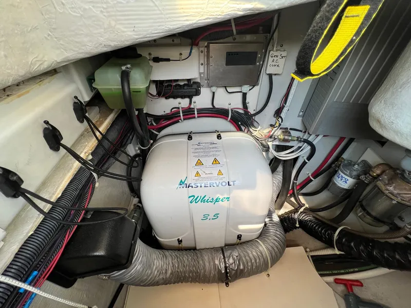 Slide: The Image of Engine compartment of a 2007 Tartan 3400 with Mastervolt Whisper 3.5 generator. - 32