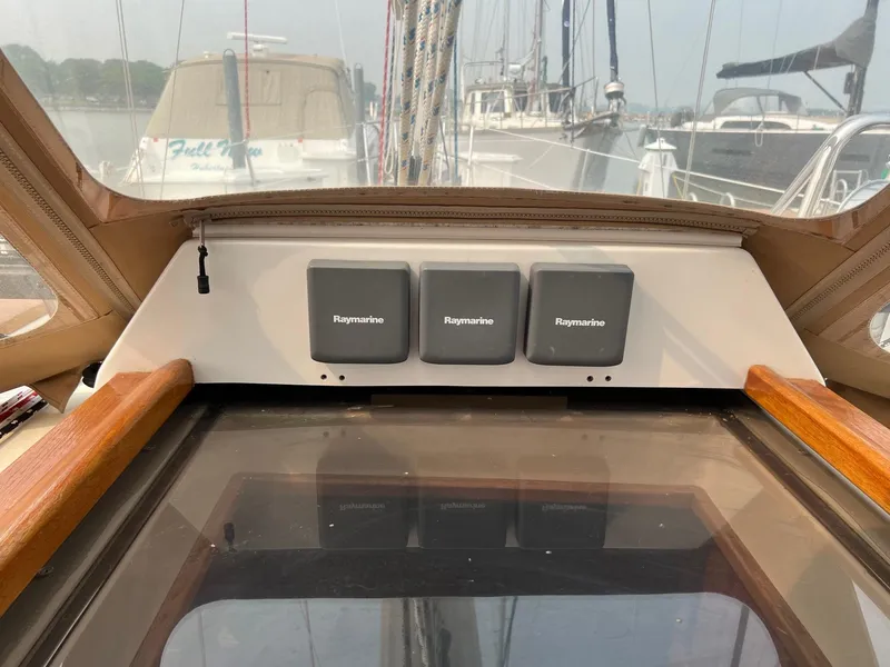 Slide: The Image of Tartan 3400 sailboat cockpit with Raymarine instruments, 2007 model, docked at marina. - 38