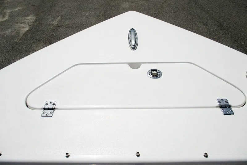 Slide: The Image of 2026 Sea Pro 240 Dual Console Deluxe boat deck with storage compartment. - 11