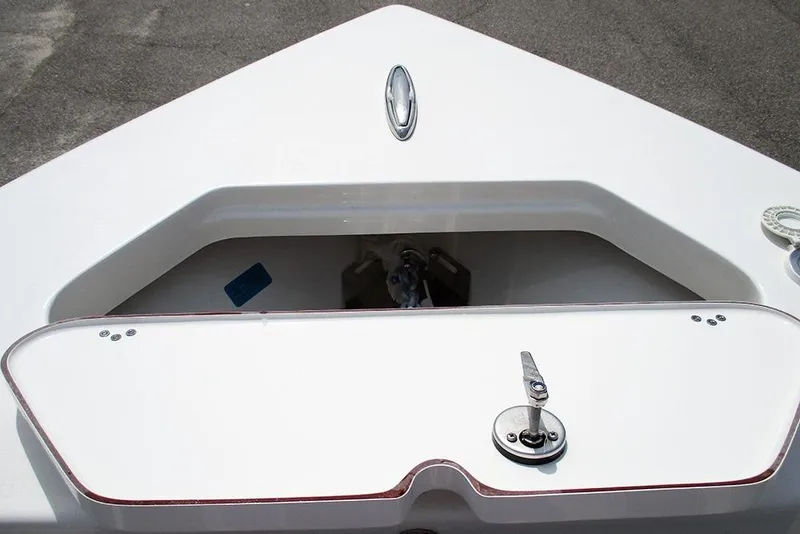 Slide: The Image of 2026 Sea Pro 240 Dual Console Deluxe boat anchor compartment detail. - 12