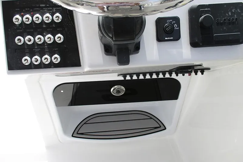 Slide: The Image of Control panel of 2026 Sea Pro 240 Dual Console Deluxe boat. - 19