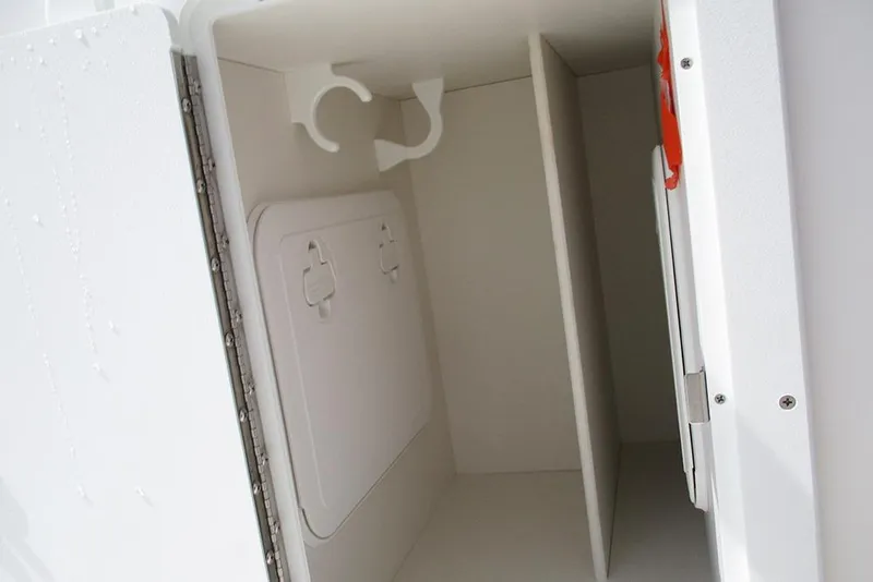 Slide: The Image of Storage compartment in 2026 Sea Pro 240 Dual Console Deluxe boat. - 24