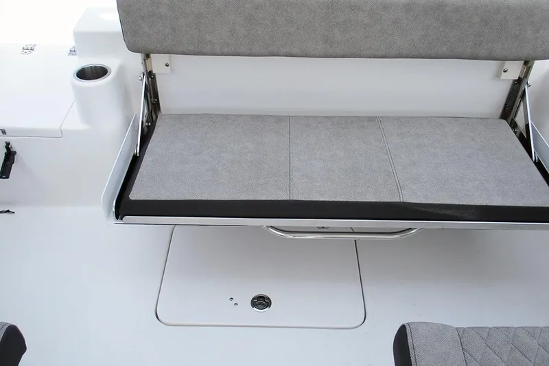 Slide: The Image of 2026 Sea Pro 240 Dual Console Deluxe boat seat with gray upholstery and cup holder. - 32