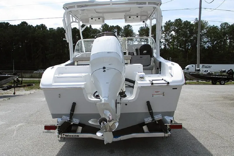 Slide: The Image of 2026 Sea Pro 240 Dual Console Deluxe boat, rear view with outboard motor. - 8