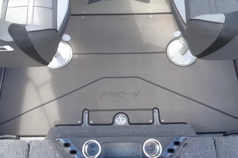 Slide: The Image of 2026 Lund 2075 Pro-V Sport boat interior with seating and deck details. - 11