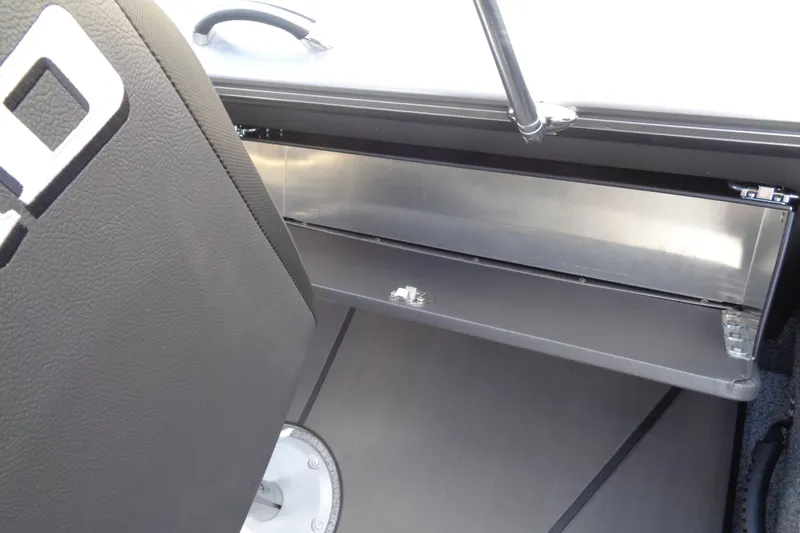 Slide: The Image of Interior view of 2026 Lund 2075 Pro-V Sport boat's storage compartment. - 23