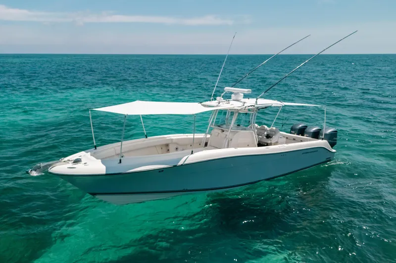 Slide: The Image of 2008 Hydra-Sports Vector 3300 CC boat on clear turquoise ocean water. - 3