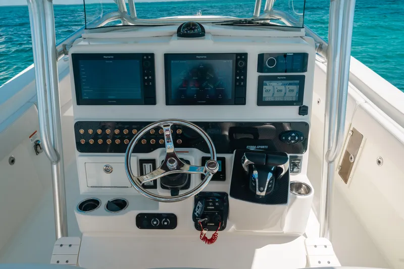Slide: The Image of 2008 Hydra-Sports Vector 3300 CC boat dashboard with modern navigation equipment. - 38