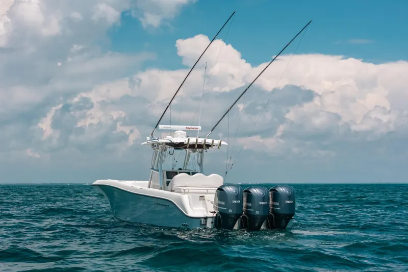 Slide: The Image of 2008 Hydra-Sports Vector 3300 CC boat on open sea with cloudy sky. - 4