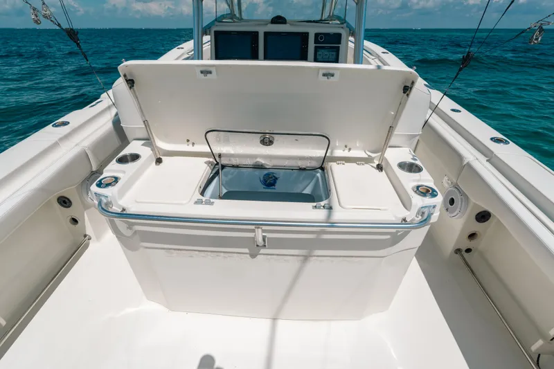 Slide: The Image of 2008 Hydra-Sports Vector 3300 CC boat with open storage compartment on deck. - 45