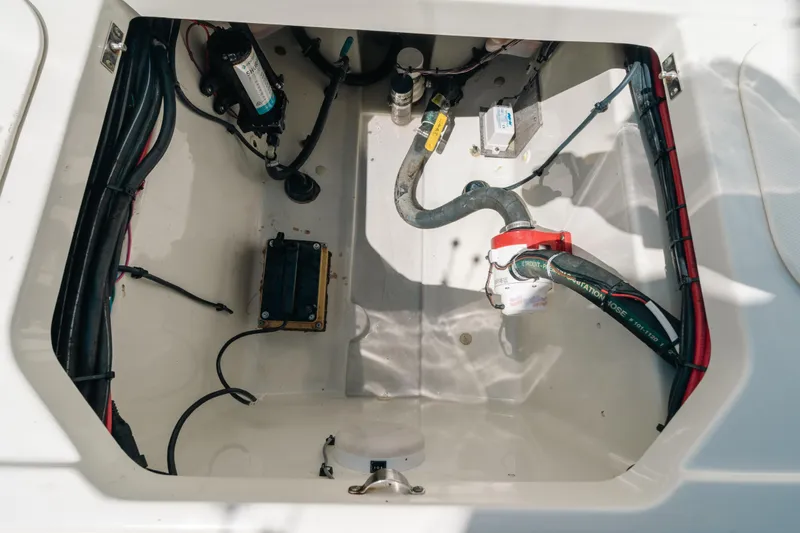 Slide: The Image of 2008 Hydra-Sports Vector 3300 CC boat compartment with wiring and hoses. - 47