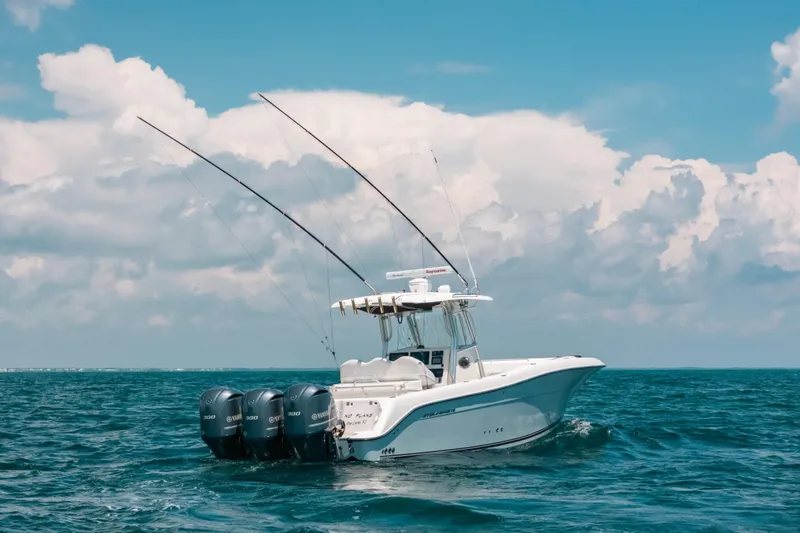 Slide: The Image of 2008 Hydra-Sports Vector 3300 CC boat on open ocean under cloudy sky. - 6