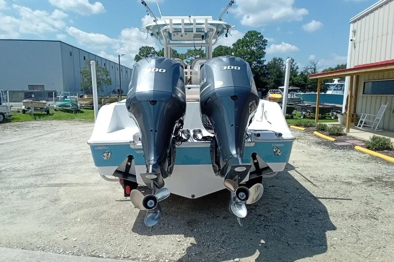 Slide: The Image of 2020 Sportsman Open 282 Center Console boat with dual Yamaha 300 engines. - 35