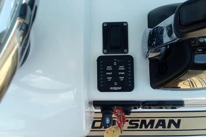 Slide: The Image of Control panel of a 2020 Sportsman Open 282 Center Console boat. - 5