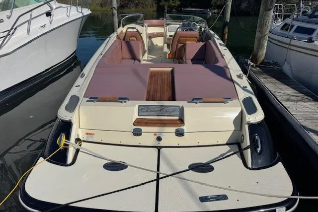 The Image of 2019 Chris-Craft Launch 30 boat docked, featuring elegant design and spacious seating. - 0
