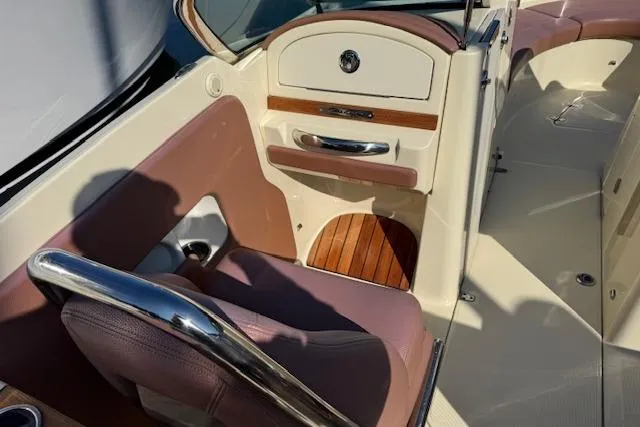 Slide: The Image of 2019 Chris-Craft Launch 30 interior with elegant seating and wood accents. - 10