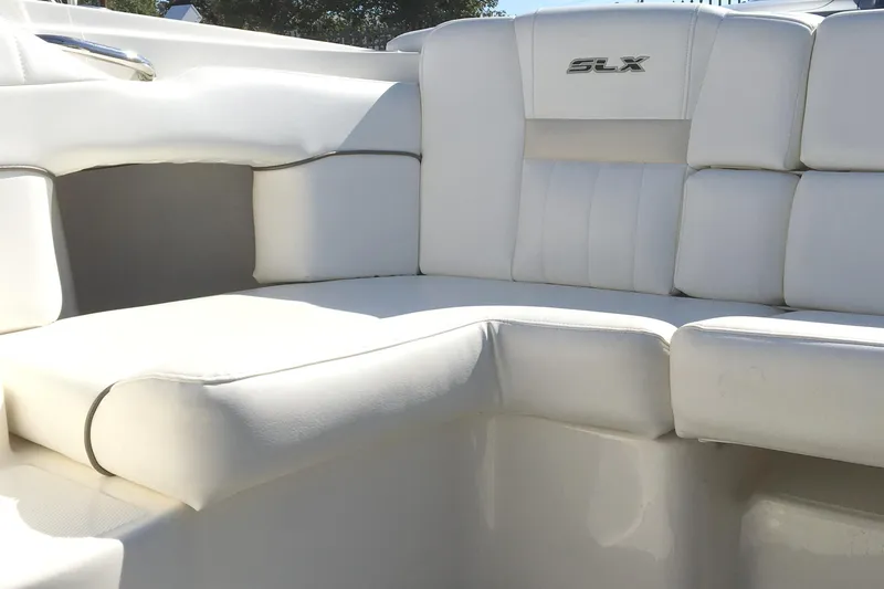 Slide: The Image of Luxurious white seating on 2008 Sea Ray 270 SLX boat interior. - 12