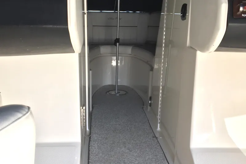 Slide: The Image of Interior view of 2008 Sea Ray 270 SLX boat cabin with seating area. - 9