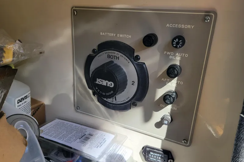 Slide: The Image of Control panel of a 2001 Bayliner 2655 Ciera boat with battery switch and accessory controls. - 24