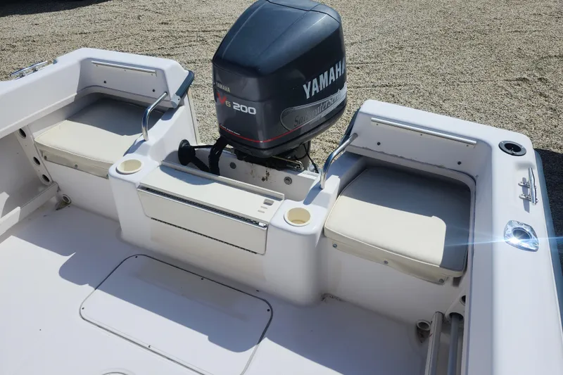 Slide: The Image of 2000 Grady-White Adventure 208 boat with Yamaha V6 200 outboard motor, rear seating view. - 9
