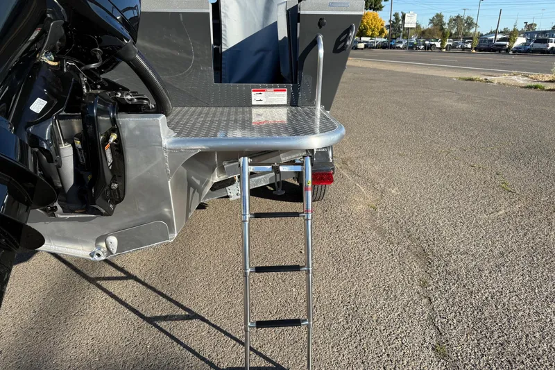 Slide: The Image of 2026 Thunder Jet 200 Luxor boat with ladder and engine detail. - 11