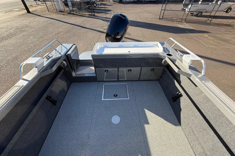 Slide: The Image of 2026 Thunder Jet 200 Luxor boat interior with spacious deck and storage compartments. - 12