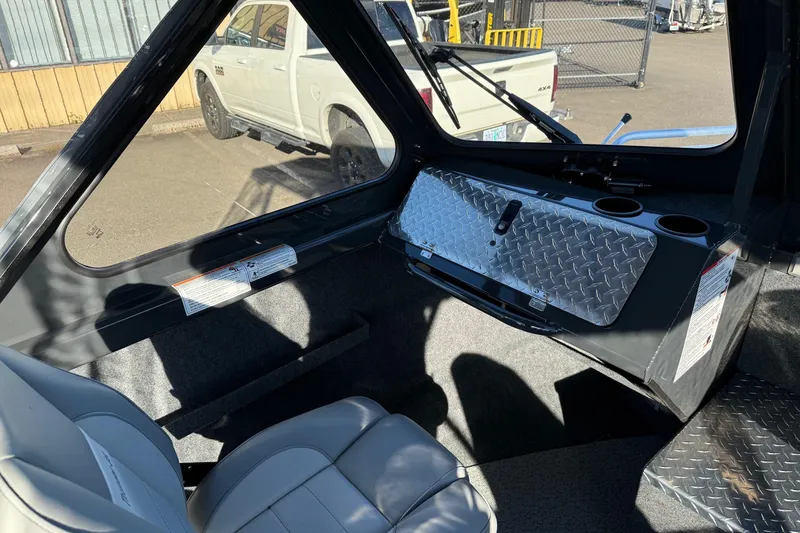 Slide: The Image of Interior of 2026 Thunder Jet 200 Luxor boat with diamond plate accents and seating. - 25