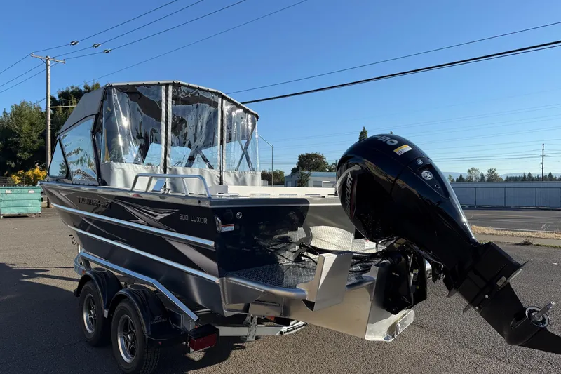 Slide: The Image of 2026 Thunder Jet 200 Luxor boat with outboard motor on a trailer. - 3