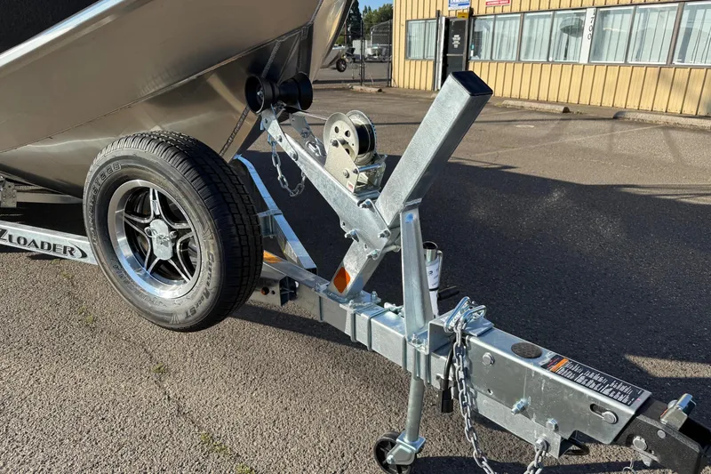 Slide: The Image of Trailer hitch of 2026 Thunder Jet 200 Luxor boat, featuring sturdy construction and durable wheel. - 6