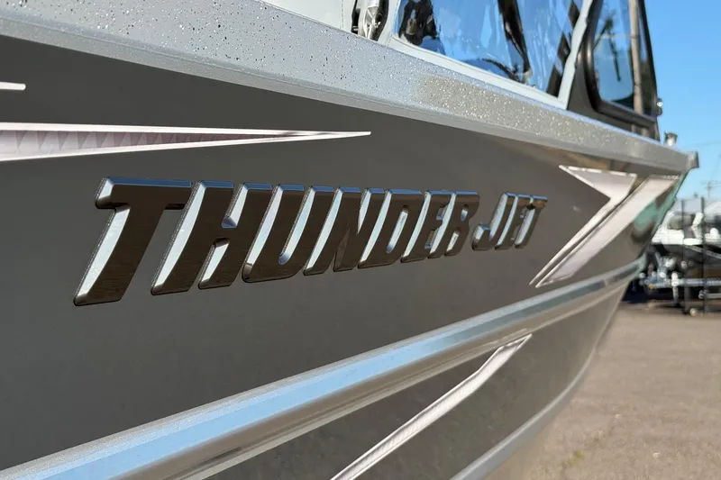Slide: The Image of 2026 Thunder Jet 200 Luxor boat with sleek metallic design and bold lettering. - 9