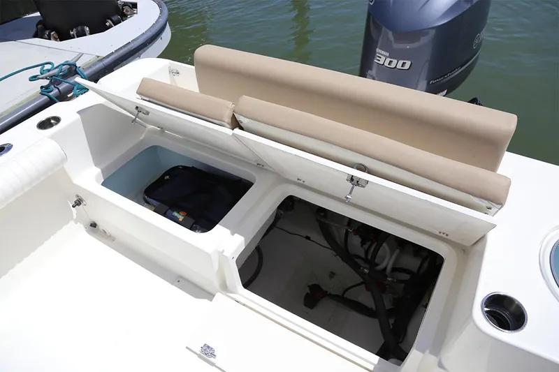Slide: The Image of 2026 Sea Born LX24 Center Console boat interior with steering wheel and control panel. - 13