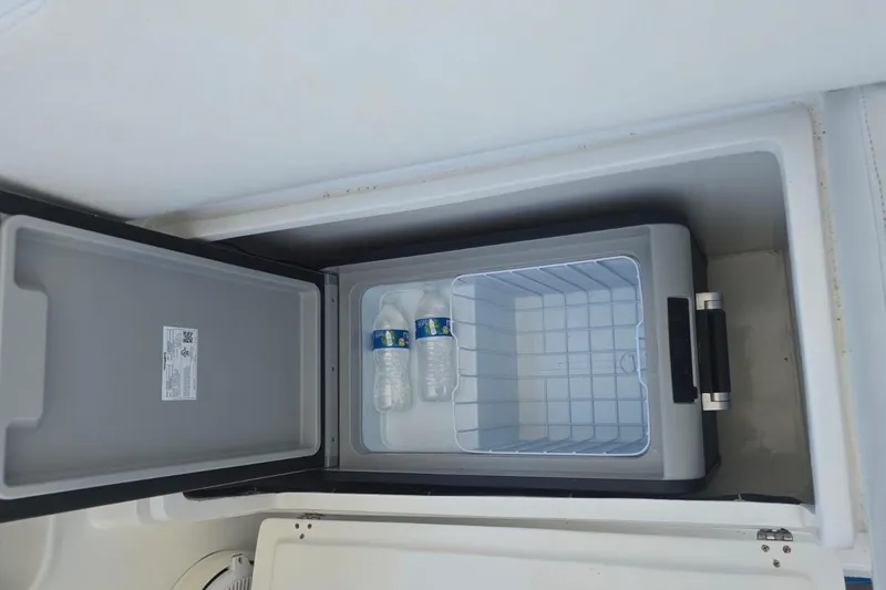 Slide: The Image of 2016 Extreme Boats 38 Cuddy Cabin interior with spacious sleeping area and modern design. - 35