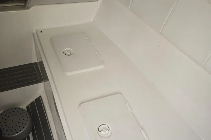 Slide: The Image of 2016 Extreme Boats 38 Cuddy Cabin interior with seating and storage area. - 43