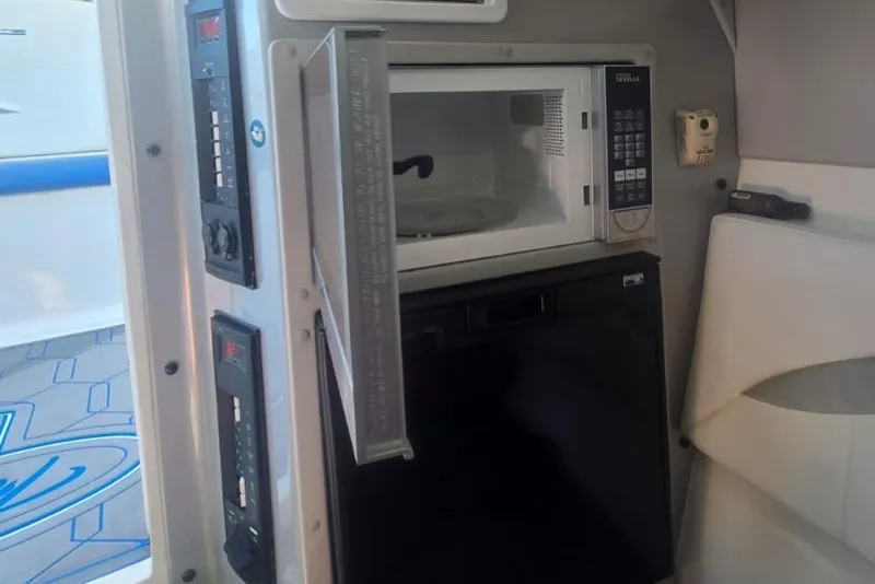 Slide: The Image of 2016 Extreme Boats 38 Cuddy Cabin interior with modern design and comfortable sleeping area. - 46