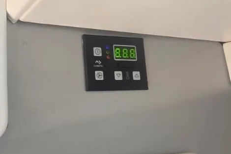 Slide: The Image of 2016 Extreme Boats 38 Cuddy Cabin interior with storage compartments. - 49