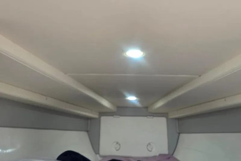 Slide: The Image of 2016 Extreme Boats 38 Cuddy Cabin with speakers on the canopy, sunny day view. - 54