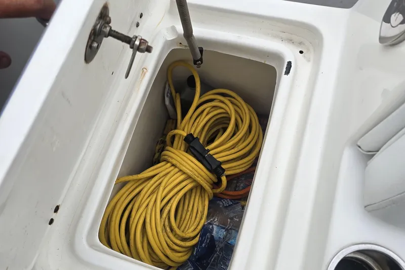 Slide: The Image of 2016 Extreme Boats 38 Cuddy Cabin interior with cushioned seating and modern flooring design. - 62