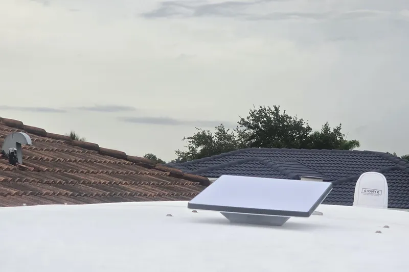 Slide: The Image of Open storage compartment on 2016 Extreme Boats 38 Cuddy Cabin, containing various items. - 63