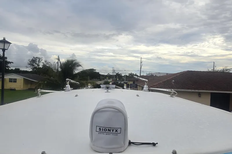 Slide: The Image of 2016 Extreme Boats 38 Cuddy Cabin interior with cooler and modern flooring design. - 66